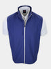 Navy blue athletic vest with a zipper is displayed over a white shirt.