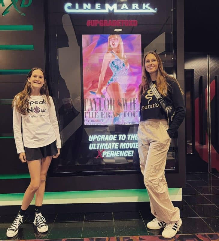 Heather with daughter at a Taylor Swift concert